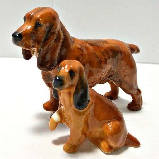Royal Doulton Cocker Spaniel pair HN 1188 adult and K9 puppy, Frederick Daws design mid-1930s, illustrating the HN-and-K pairing tradition, A Dog's Tale Collectibles